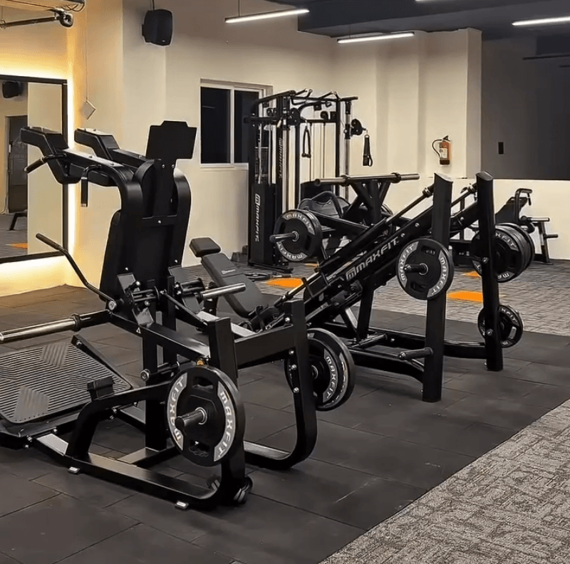 Gym cardio area with modern fitness machines